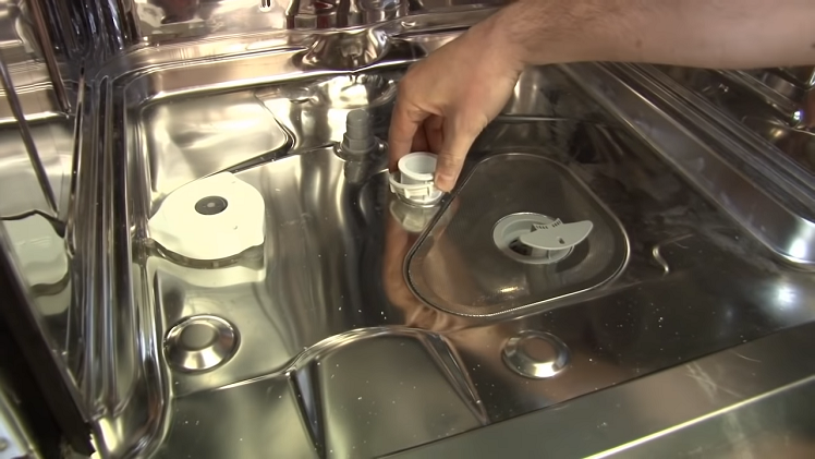 Unscrewing The Lower Spray Fixing Kit And Removing It From The Dishwasher
