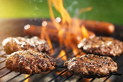 Burgers Grilling On Barbecue