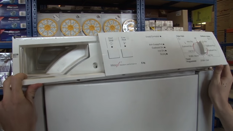 Lifting Up The Tumble Dryer Control Panel Fascia