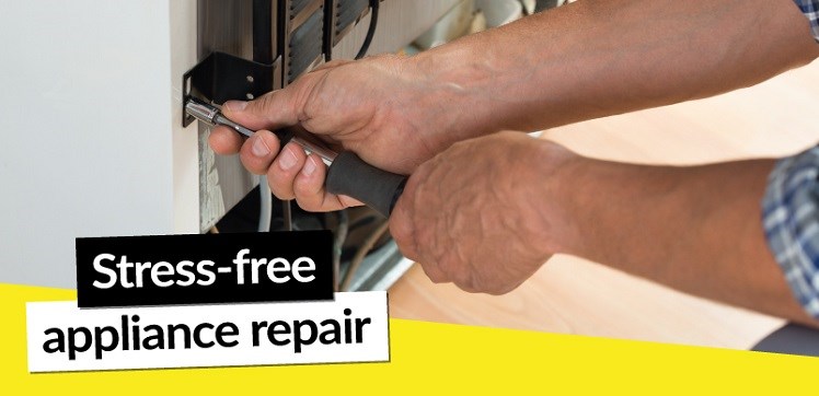 Man repairing an appliance