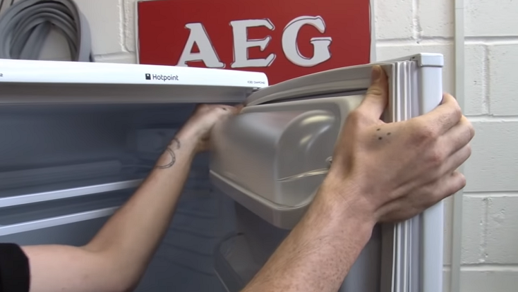 Attaching The New Fridge Door Seal Into Place