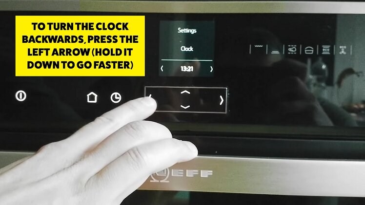 Press and hold down the left arrow button to turn the time backwards on the display clock