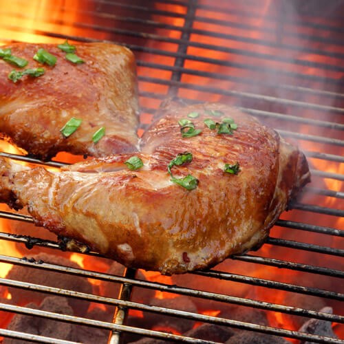 Chicken Cooking On Barbecue Grill