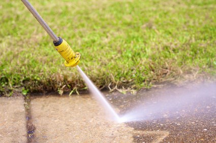 Cleaning A Patio With A Pressure Washer