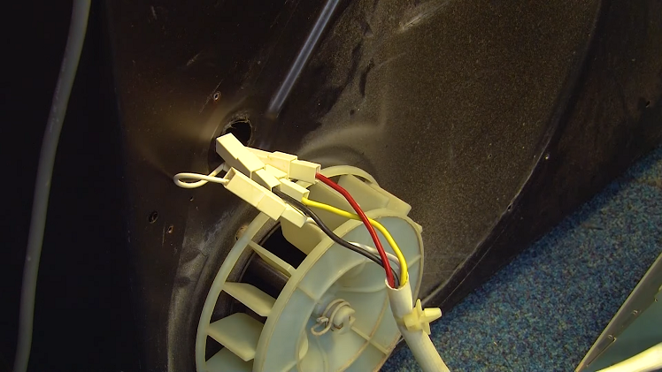 Reconnect the electrical wire connections on your tumble dryer's heater