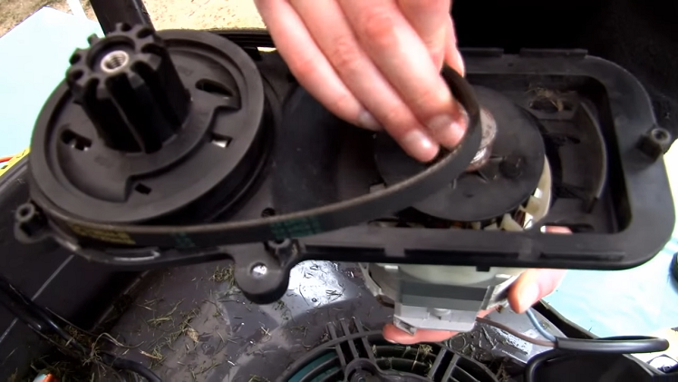 Removing The Lawnmower Belt From The Drive Assembly By Hand