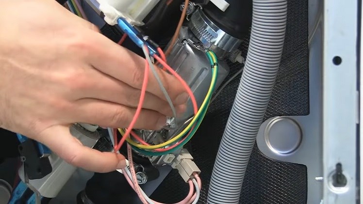 The Flow Through Heater Located In The Dishwasher Base