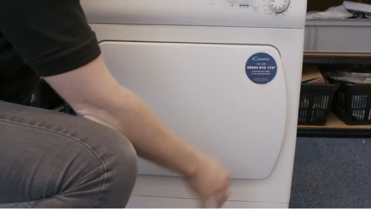 Opening And Closing The Tumble Dryer Door A Few Times To Make Sure It Is Closing Correctly