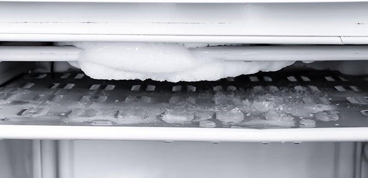 Inside An Overly Frosted Fridge Freezer