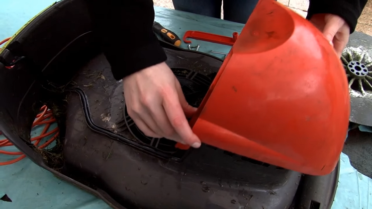 Lifting Off The Lawnmower Motor Cover