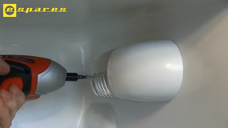 Placing The Cover Back Over The Bulb And Screw It Back Into Place Inside The Fridge