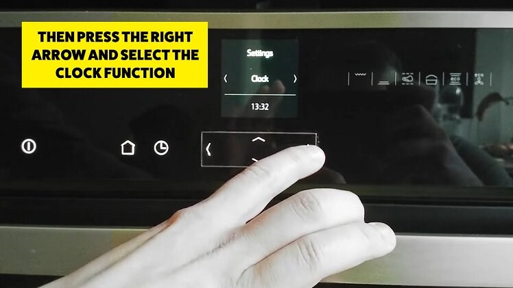 Press the right arrow button to change the displayed option from 'language' to 'clock'