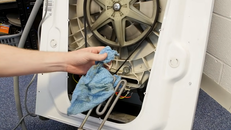 How to access the heating element to remove trapped items