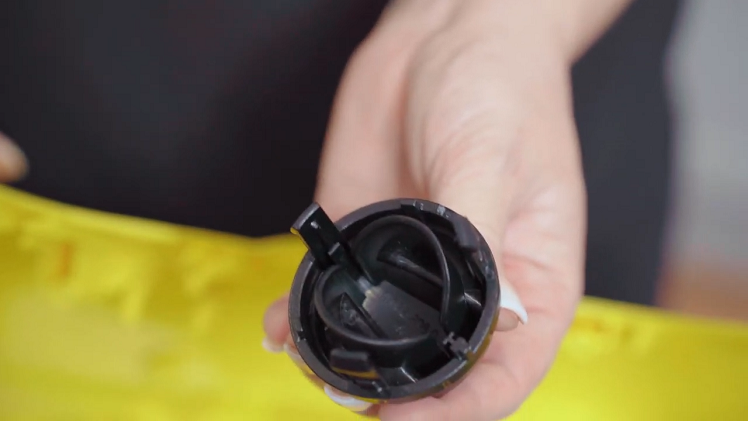 Pull the control knob out of the front of the casing.