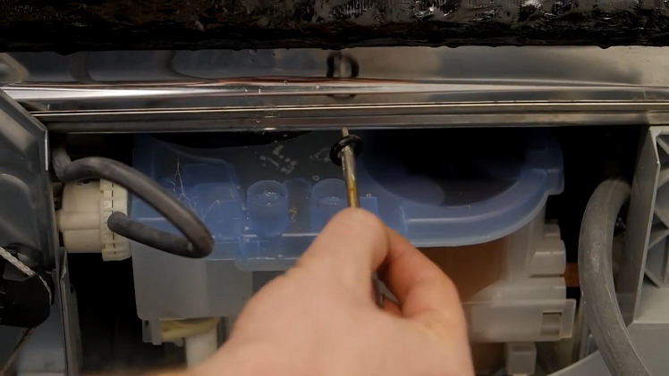 Lifting The O-Ring Seals Out With The Tip Of A Screwdriver