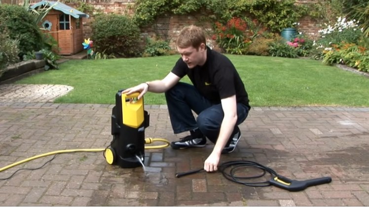 Turning On The Garden Hose Tap And Running The Water Through The Pressure Washer System For A Minute Or Two