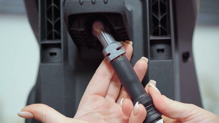 Slot the hose connection all the way into the back connection until it clicks into place