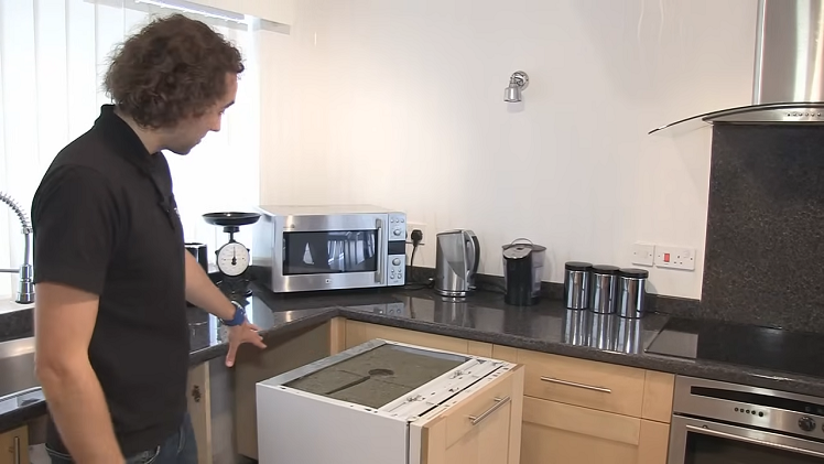 Clearing The Space In Which The Dishwasher Is Going To Be Fitted