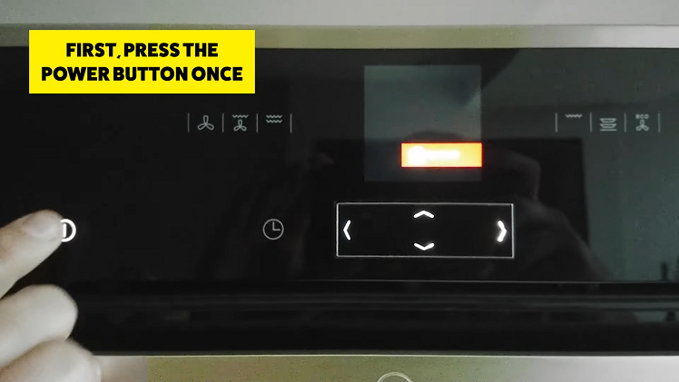 Activate the display screen on your Neff combination microwave oven by pressing the power button to the far left.
