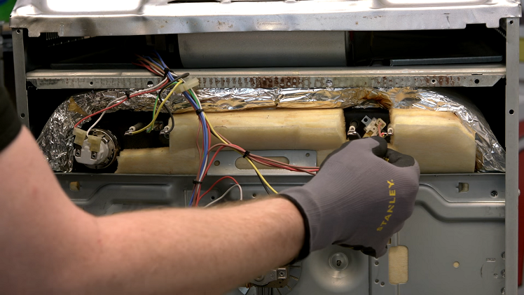 Disconnecting The Two Electrical Wires Connected To The Thermal Cut Out