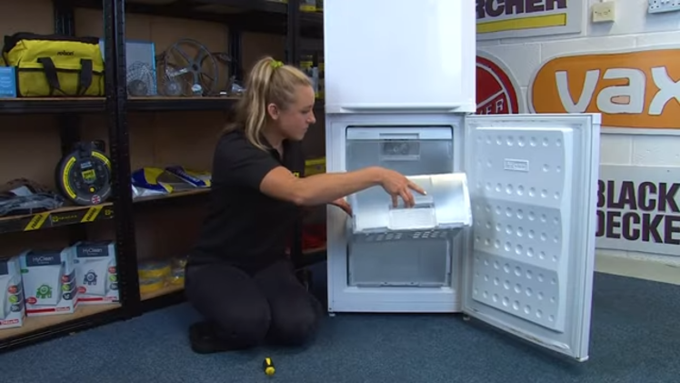 Refitting The Freezer Drawer Back Into The Freezer
