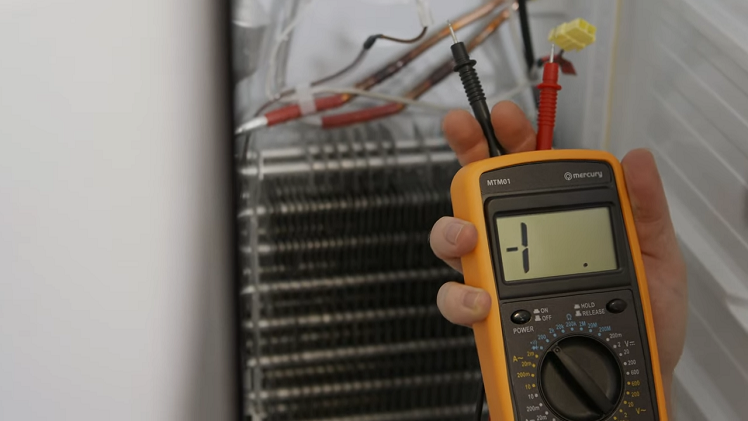 Testing The Defrost Heater With The Probes On A Multimeter