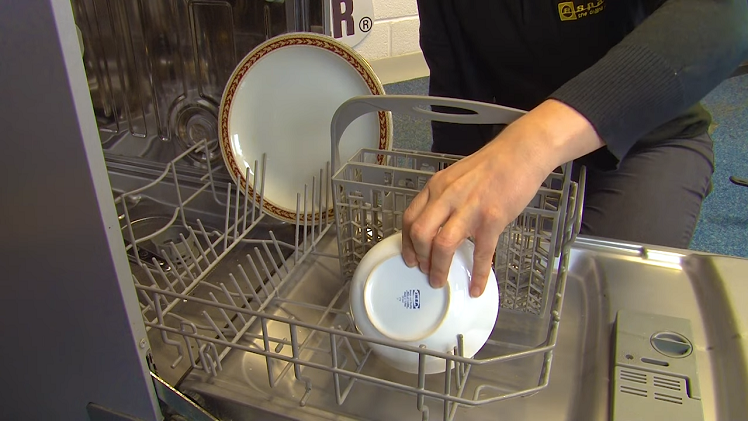 A Bowl Facing Inwards And Downwards On The Dishwasher Lower Basket