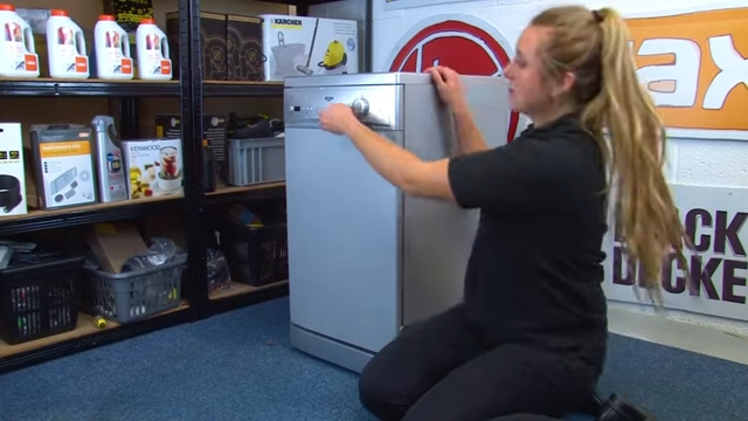 Checking The Front Of The Dishwasher For The Rating Plate