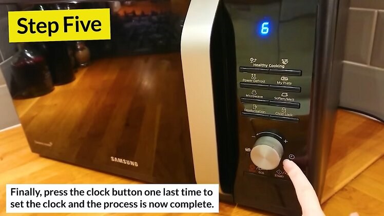 Pressing The Clock Button On The Samsung Microwave One More Time To Set The New Time