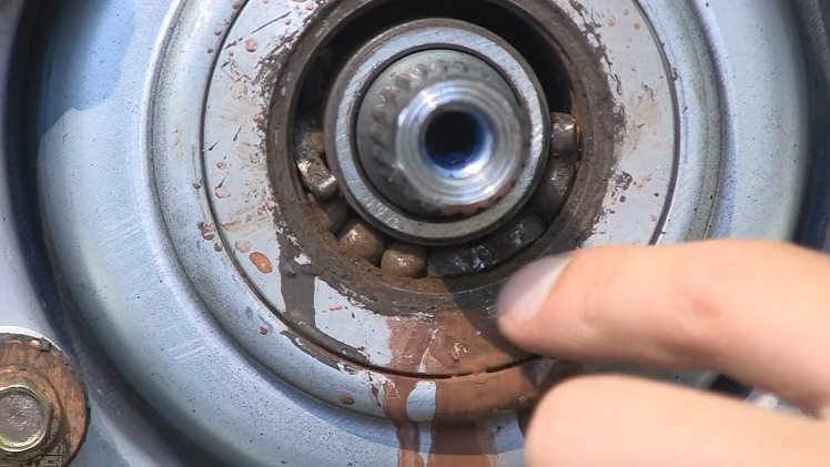 If the bearings have started to fall and gather around the bottom, they will need to be replaced.