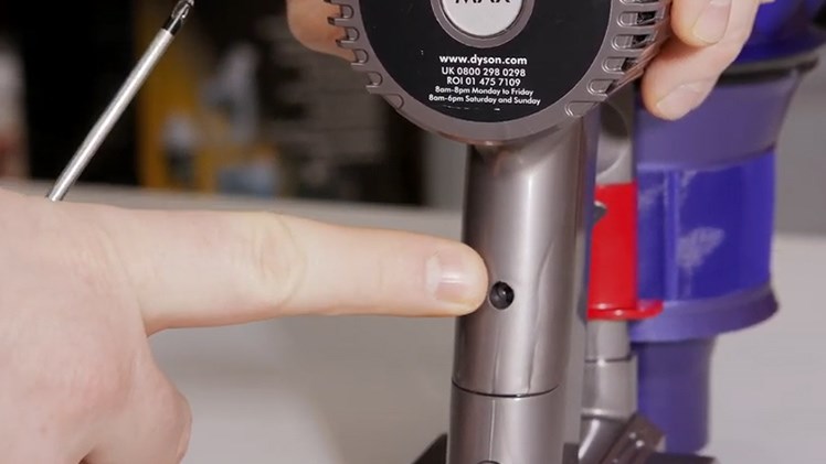 Undo the screw at the back of the handle