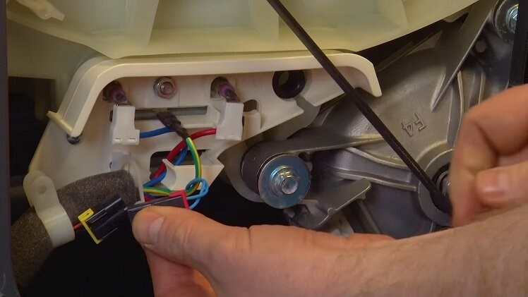 Disconnect the electrical wire connection between the thermostat and the washing machine