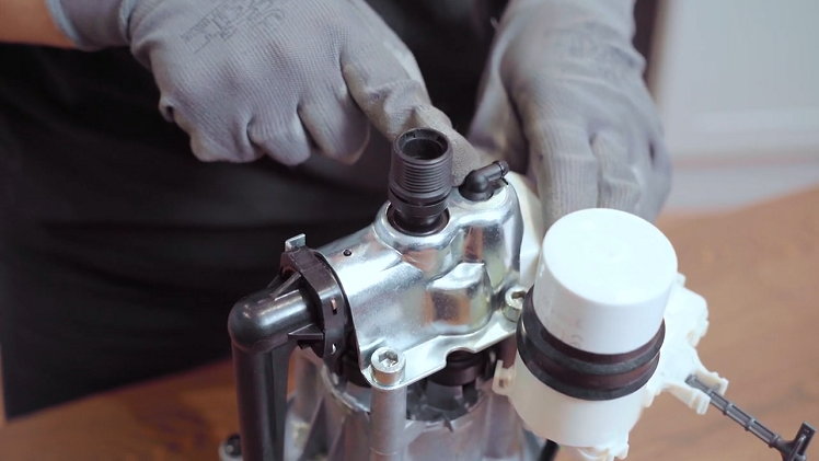 Check the pump cylinder head, which is positioned at the top of the pump above the motor.