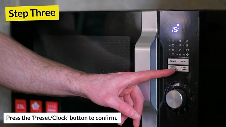 Pressing The Preset/Clock Button On The Sharp Microwave Again To Confirm And Set The Hour On The Clock