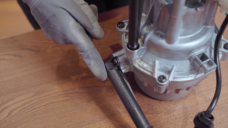 The water inlet pipe at the bottom of the motor.