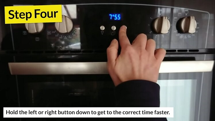 Holding The Right Button Beneath The Belling Oven Clock Down To Get To The Correct Time Faster