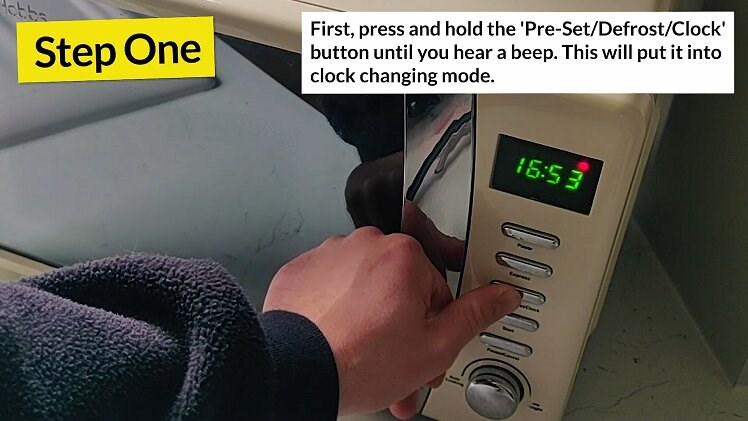 Press and hold down the button labelled 'Pre-Set/Defrost/Clock' to enter clock-changing mode