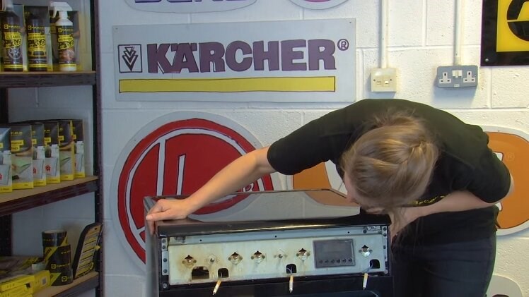 Turn the top panel over so that it's the right way up and reposition it into place on top of the oven