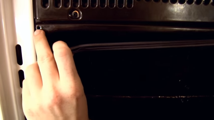 The Hole On Each Corner Of The Oven Where The Door Seal Hooks Onto