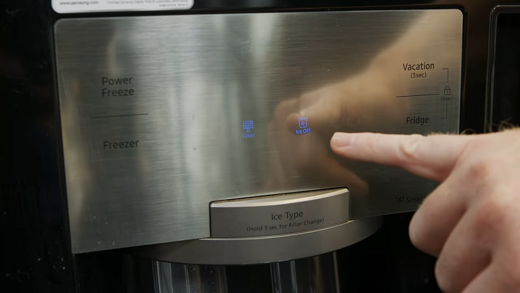 The Blue Ice Off Symbol Lit Up On The Ice Maker