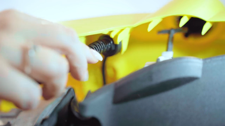 Remove the mains cable from the inner clip that holds it in place.