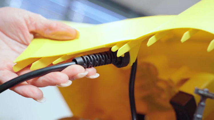 Reconnect the mains cable to its clip inside the casing.