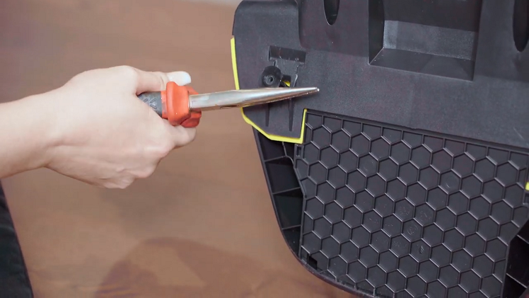 Once the lugs have been pulled out a little, use your pin nose pliers to work the lugs all the way out.