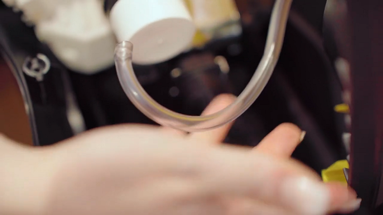 Now, returning to the soap dispenser hose, you will need to pull off the end that's connected to the small soap feed pipe.