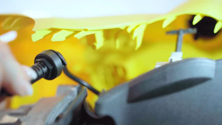 Remove the mains cable from the inner clip that holds it in place.
