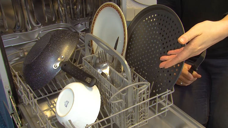 The Cutlery Basket Placed On The Dishwasher Lower Basket