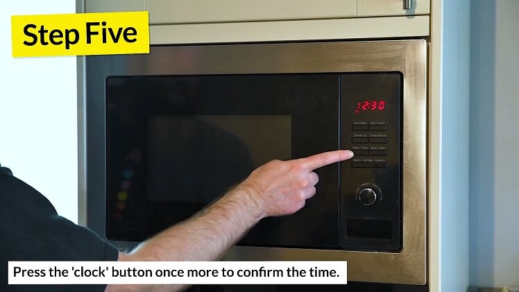 Press the 'clock/timer' button once more to confirm the minutes and finish setting the time