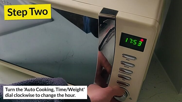 Turn the dial on your microwave either backwards or forwards to change the hour