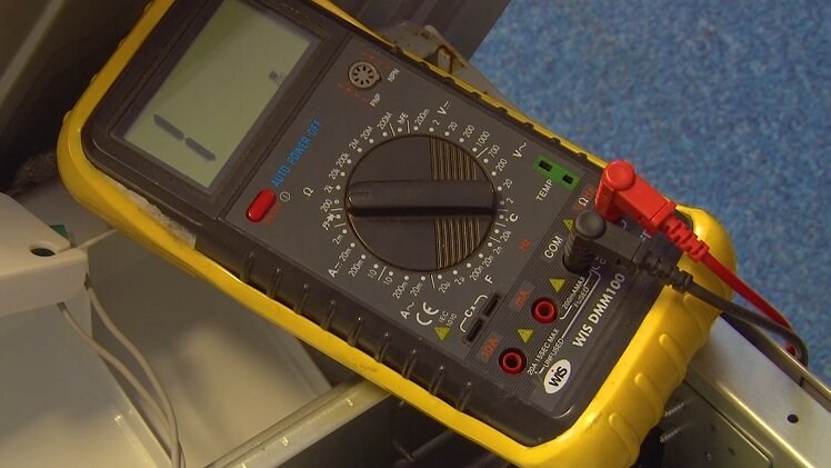 Turn the dial on the multimeter to 200 ohms and make sure the red and black prongs are plugged in.