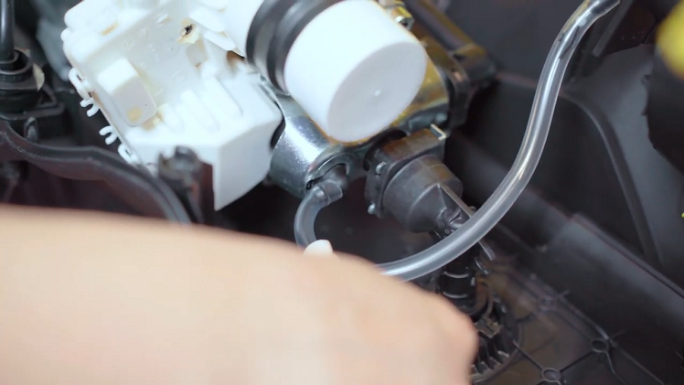 To fix the Karcher detergent dispenser bottle hose leak, make sure the small hose is securely connected on both ends.